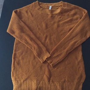 Women’s mustard yellow sweater.